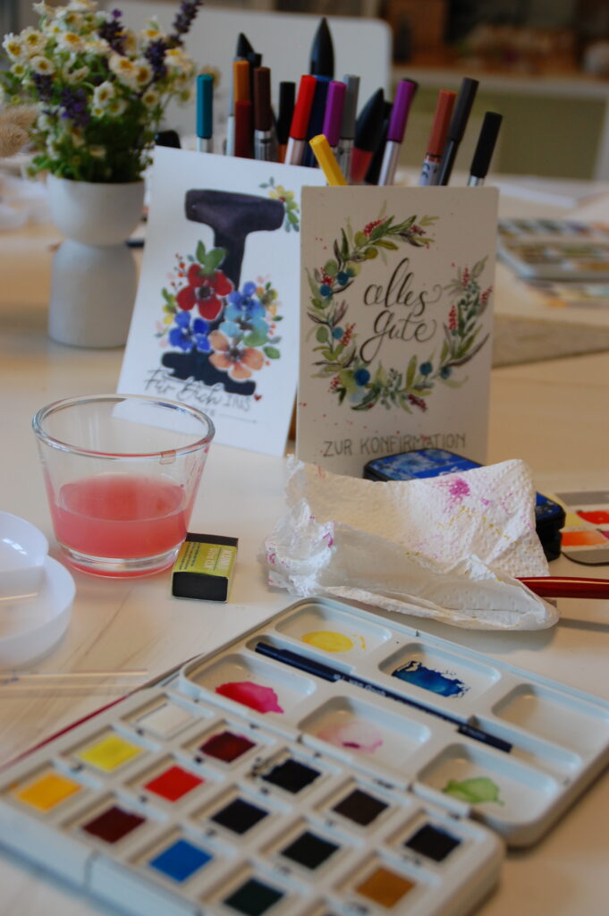 Workshoptisch mit Aquarellfarben Workshoptisch mit Aquarellfarben